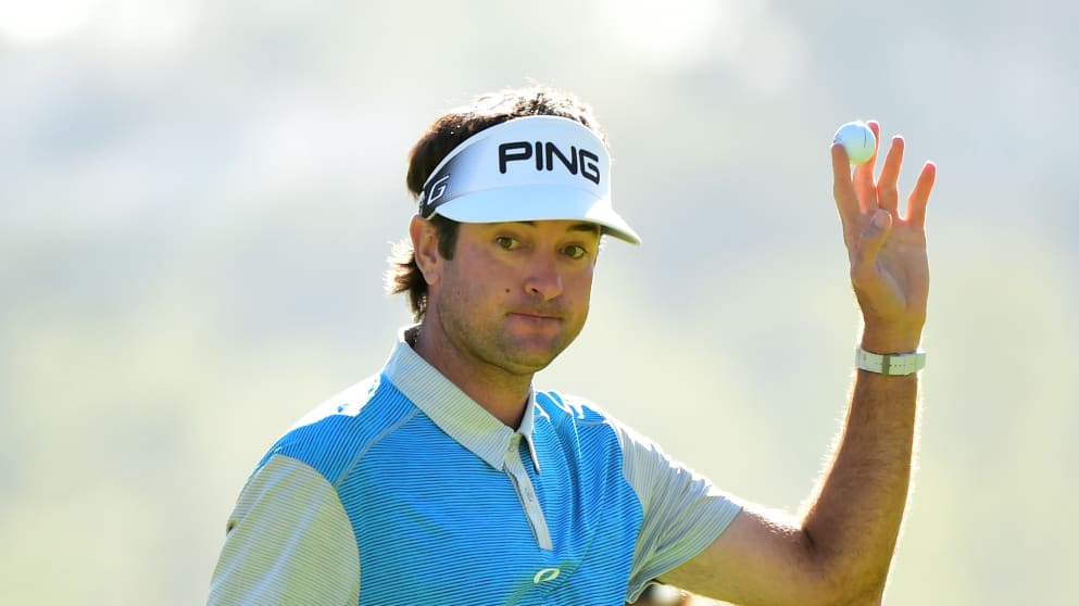 Bubba Watson reacts after making a putt