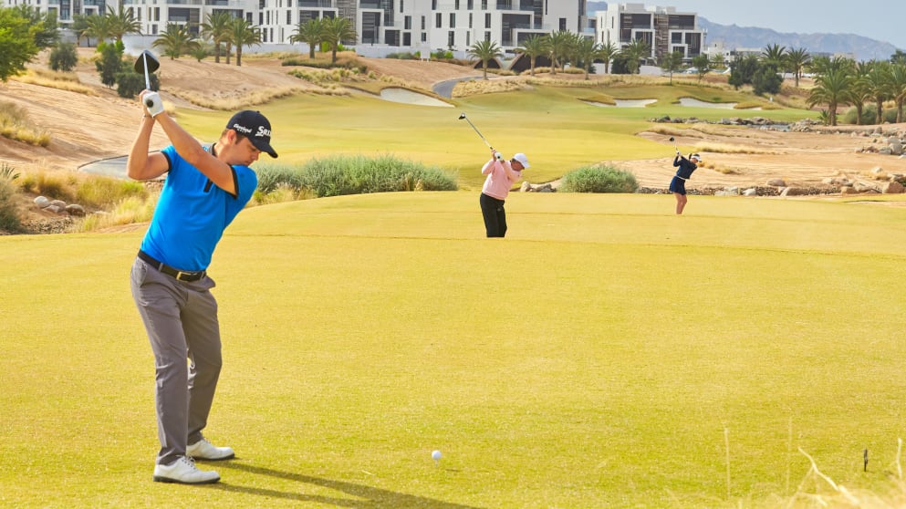 Borja Virto, Barry Lane and Olivia Cowan tee off at Ayla Golf Club