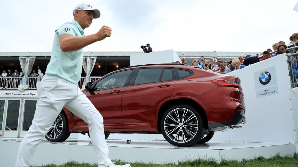 Matt Wallace of England walks off the 18th