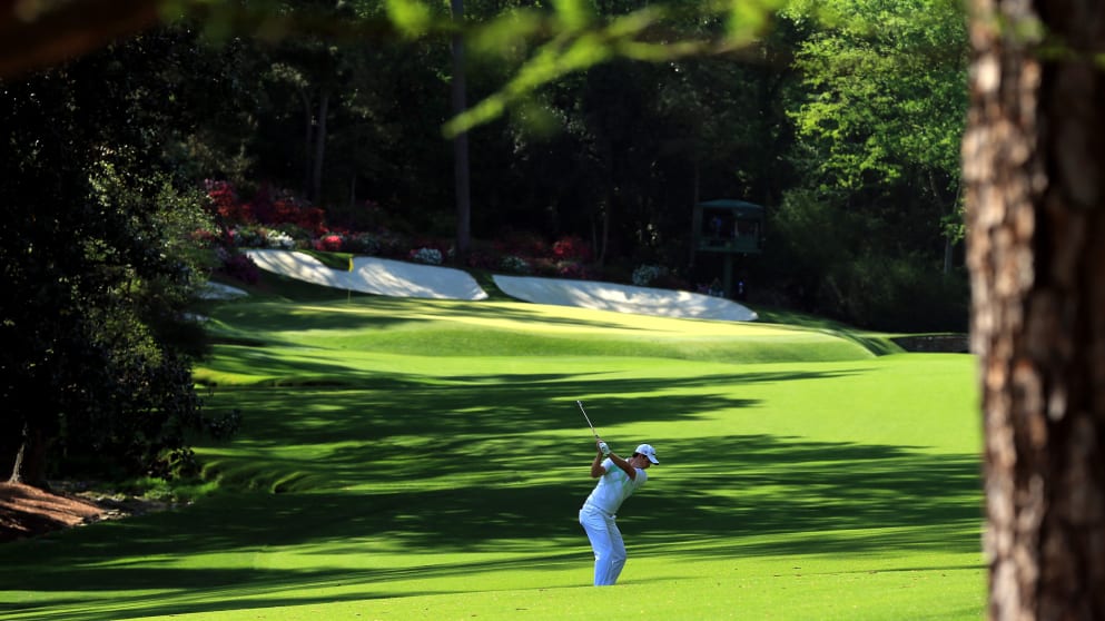 Justin Rose plays his second into the par five 13th hole