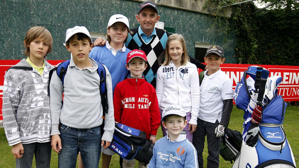 Markus Brier with local children who attended his coaching clinic
