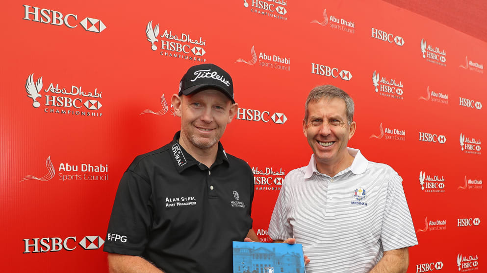 Stephen Gallacher is presented with a commemorative gift for his 500th European Tour appearance