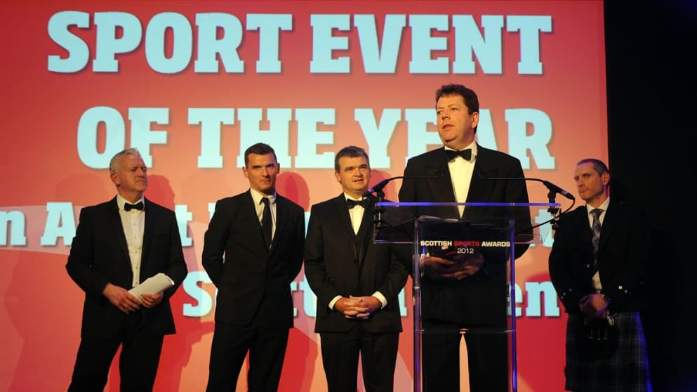 Peter Adams (second right) accepts the Sporting Event of the Year. Also in picture are (left to right): TV presenter Rob Maclean, Lee McCulloch, Paul Lawrie and Stuart Turner