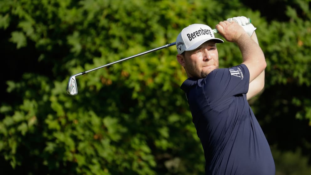 Branden Grace plays his shot from the 12th tee 