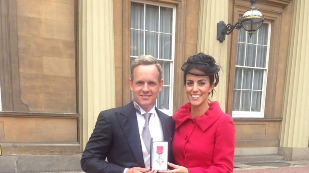 Luke Donals with his wife Diane after receiving an MBE at Buckingham Palace