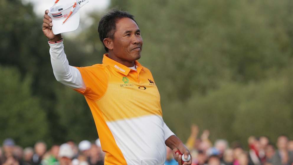 Thongchai Jaidee of Thailand celebrates holeing the winning putt on the 18th hole