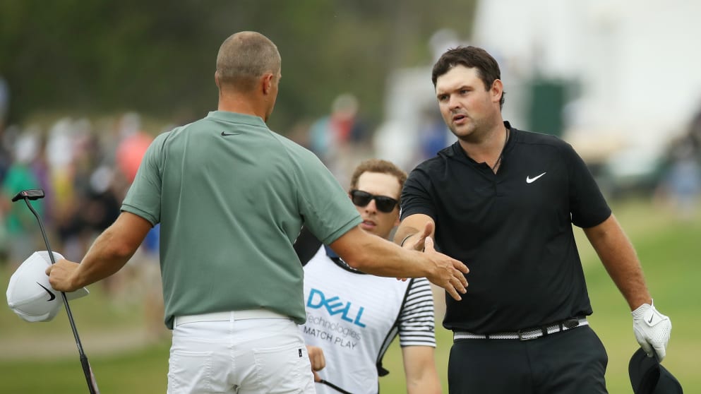 Alex Noren shakes hands with Patrick Reed