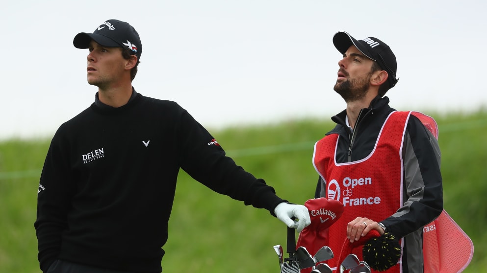 Thomas Pieters and his caddy