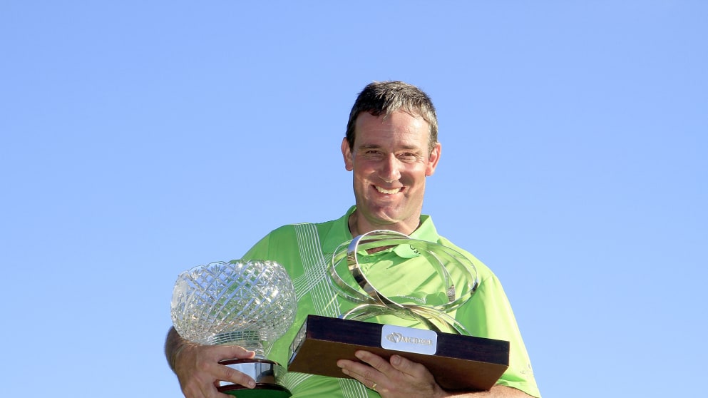 Paul Wesselingh with the John JacobsTrophy and the MCB Tour Championship Trophy