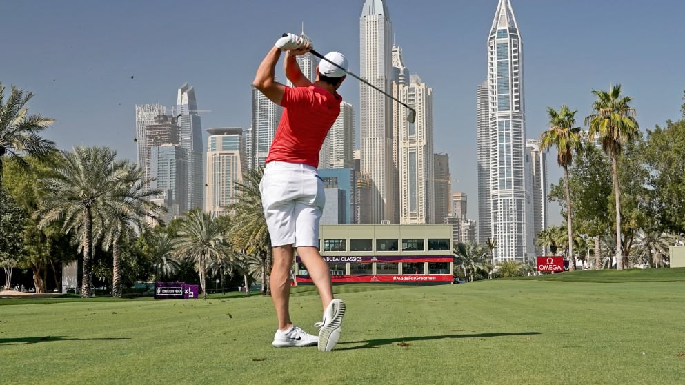 Rory McIlroy - plays a short iron shot in practice ahead of the 2018 Omega Dubai Desert Classic