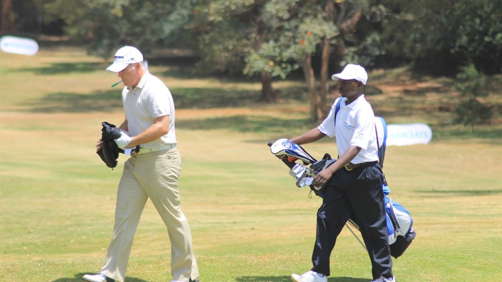 Phillip Archer with Glad's House Foundation graduate caddy Julius Amos Ndeta