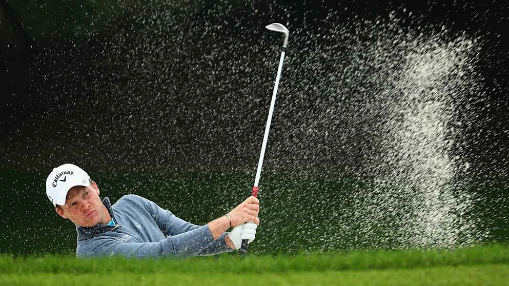 Danny Willett hits a bunker shot during WGC HSBC Champions practice