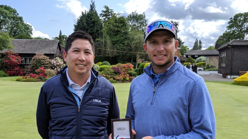 Tommy Tangtiphaiboontana, USGA Director of International Competitions, and Dean Burmester