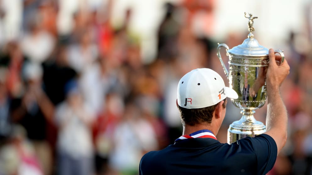 Justin Rose celebrates with the US Open trophy 