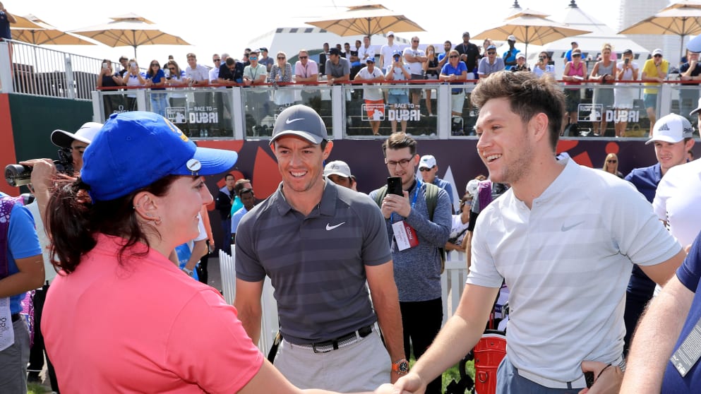 Niall Horan and Rory McIlroy meet Saoirse Lambe, winner of a Pro-Am Competition