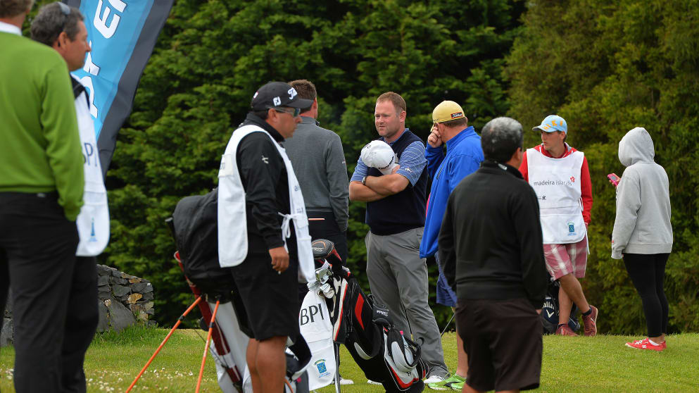Alastair Forsyth of Scotland (C), talks to fellow golfers after has caddie Ian MacGregor tragically died on the 9th Fairway during the final round of the Madeira Islands Open - Portugal - BPI 