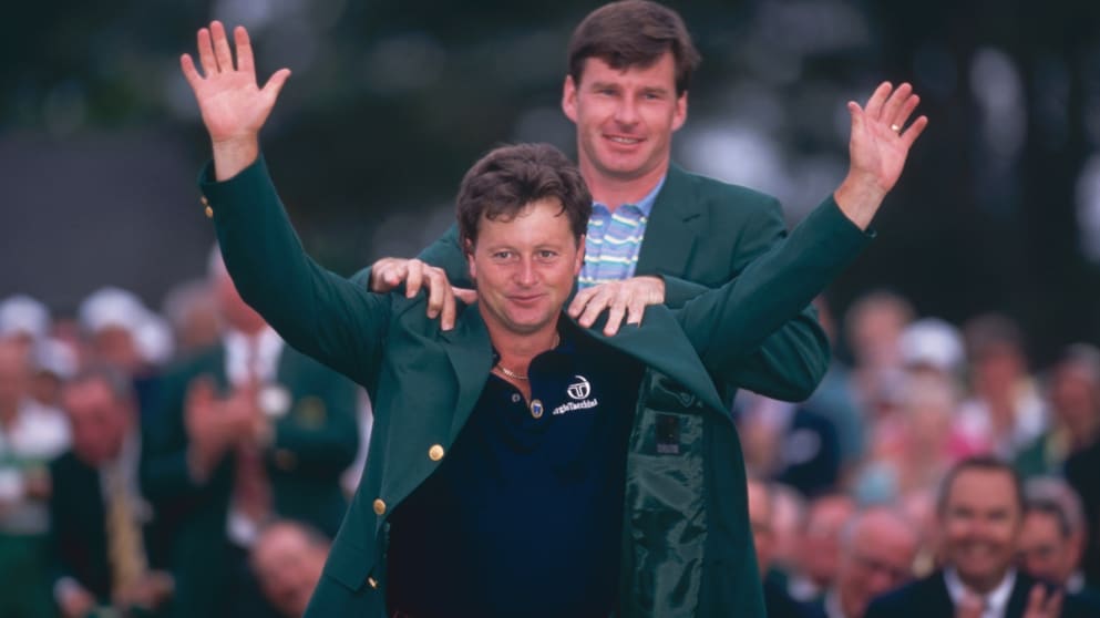 Ian Woosnam receives the Green Jacket from Nick Faldo