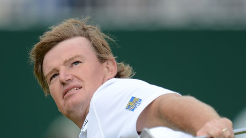 Ernie Els  celebrates his birdie on the 18th