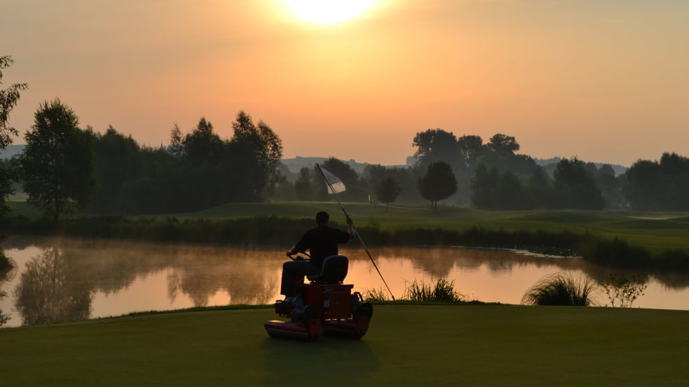 A greenkeeper on the Beckenbauer Course at Hartl Resort