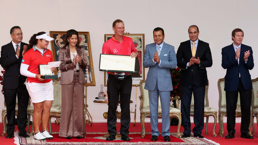 Ariya Jutanugarn  and Marcel Siem  are awarded their trophies by HRH Prince Moulay Rachid after the Trophee du Hassan II and the La Coupe Lalla Meryem
