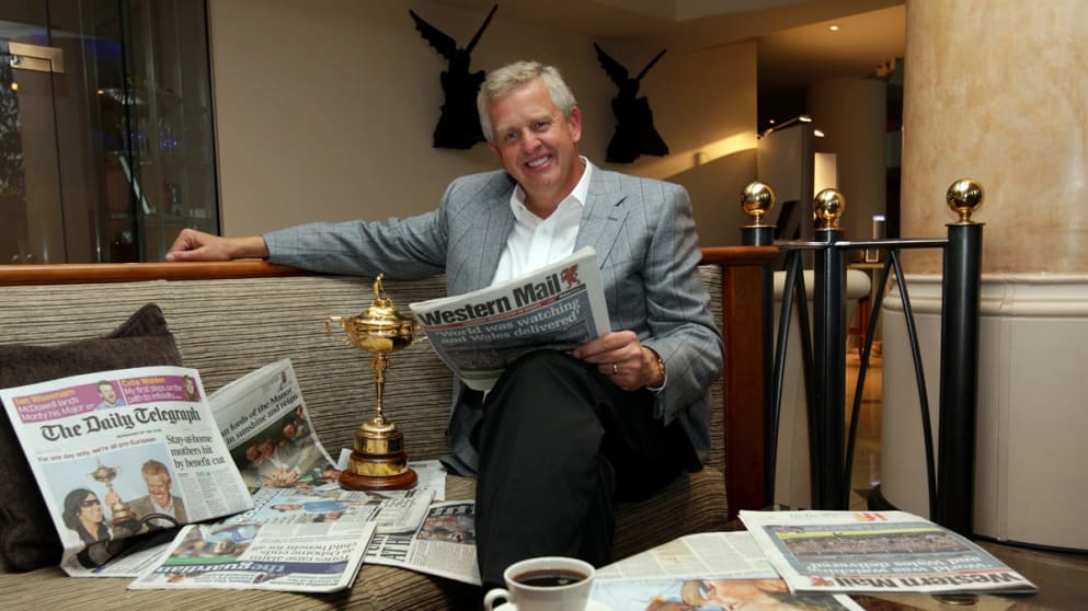 European Captain Colin Montgomerie reads the morning papers