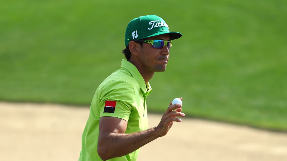 Rafa Cabrera Bello acknowledges the crowd at Abu Dhabi GC