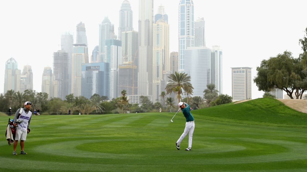 Jeunghun Wang of China plays his second shot into the 14th green 