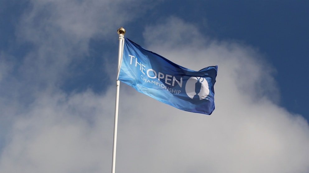 The Open flag flies above the course 
