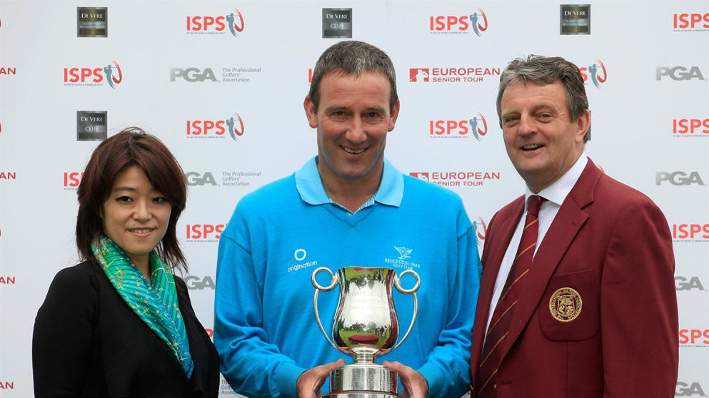 Paul Wesselingh receives the ISPS Handa PGA Seniors Championship trophy