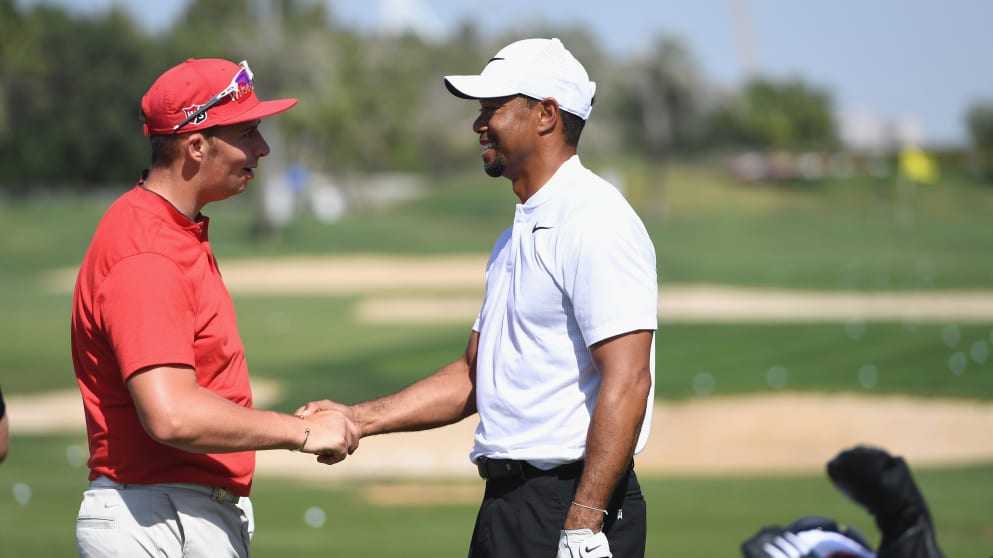 Tiger Woods shakes hands with Marcus Armitage in Dubai