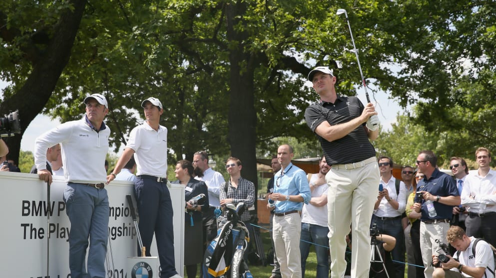 US Open Champion Justin Rose has a pot at the nearest the pin challenge in Hyde Park under the watchful eye of Matteo Manassero and Paul McGinley