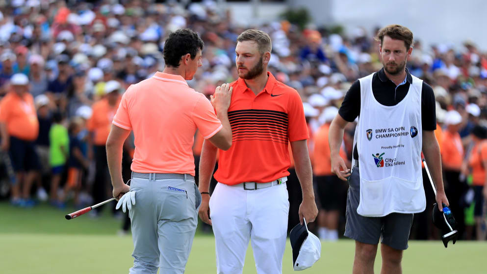   Rory McIlroy and Jordan Smith