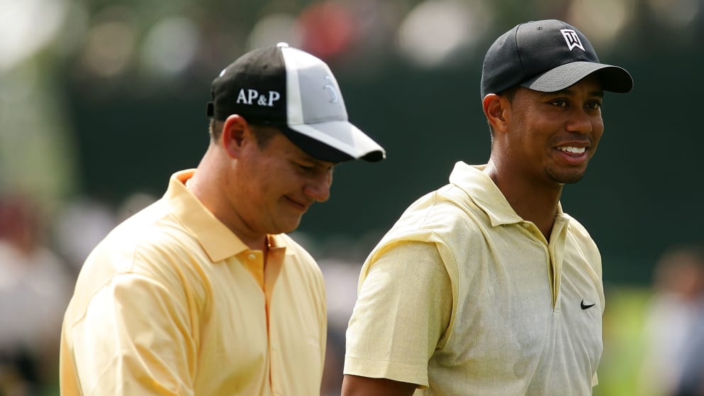 Marc Cayeux playing alongside Tiger Woods