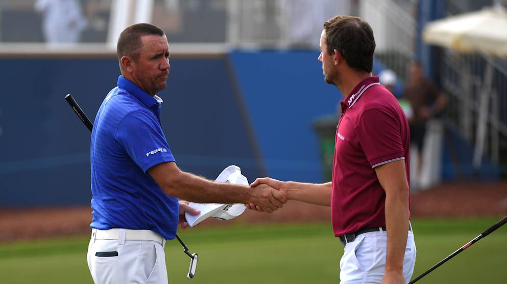 Scort Hend and Alexander Bjork shake hands after impressive opening rounds