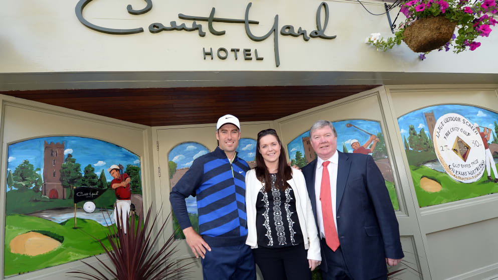 Leixlip ambassador Ross Fisher with the owners of the Courtyard Hotel, Laura Darragh and Luke Moriarty
