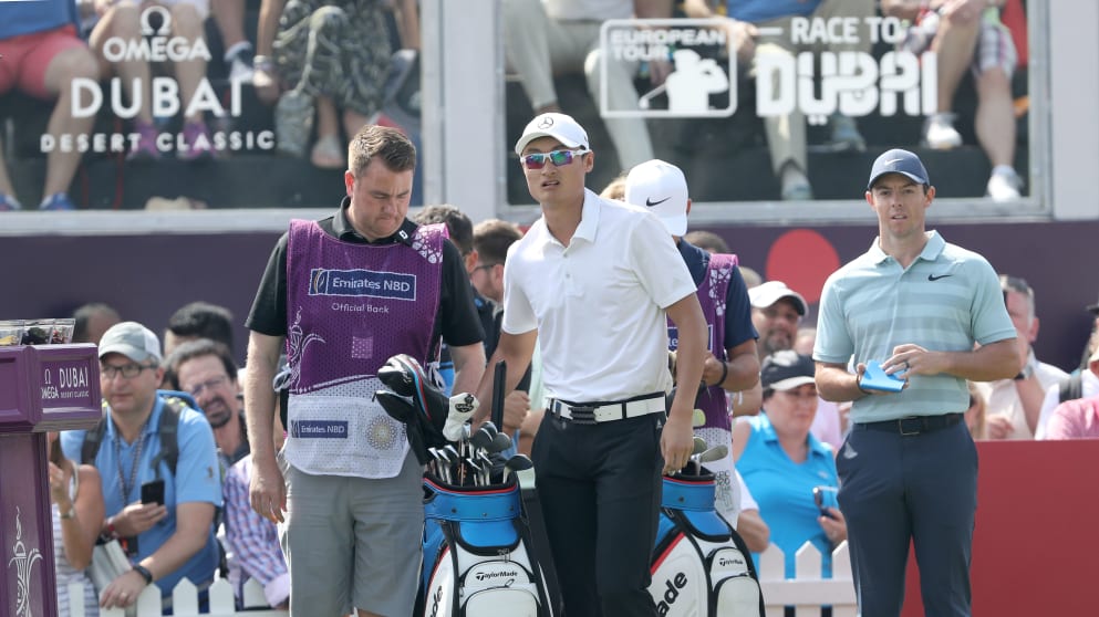 Li Haotong and Rory McIlroy