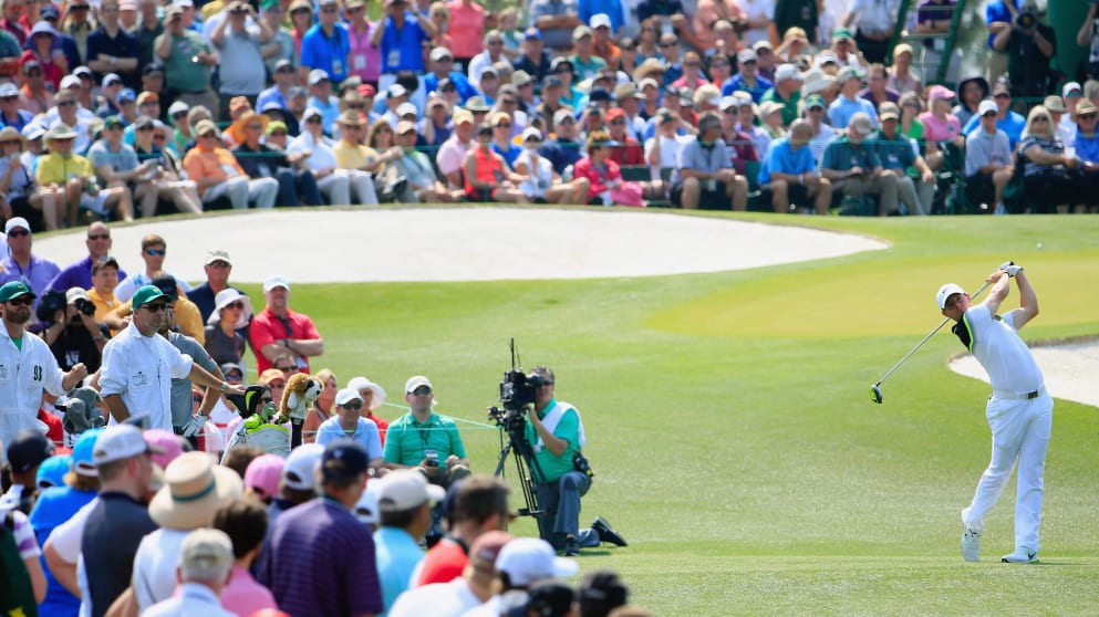 Rory McIlroy - watches his tee shot on the third hole during the first round of the 2015 Masters Tournament 