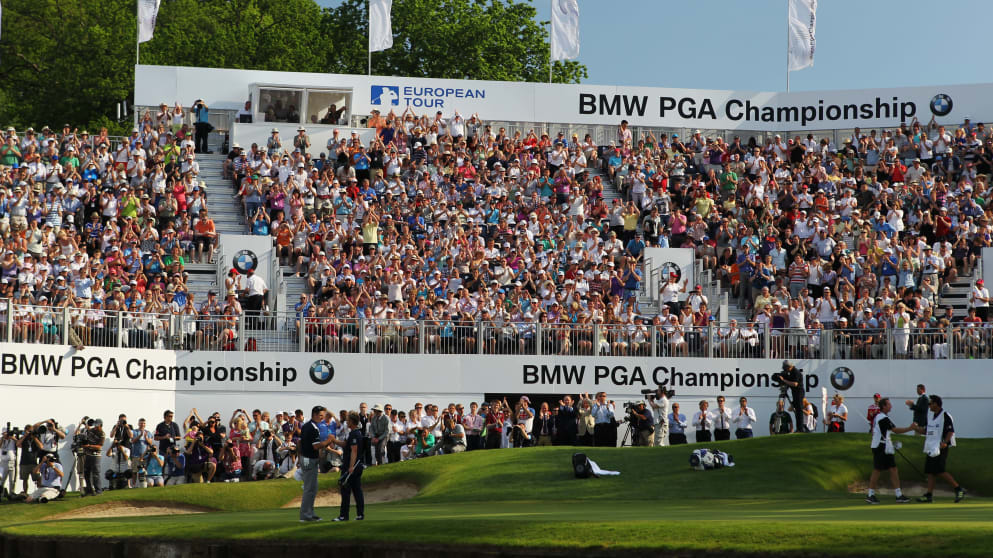 Justin Rose and Luke Donald shake hands on the 18th green during the final round of the BMW PGA Championship on the West Course at Wentworth