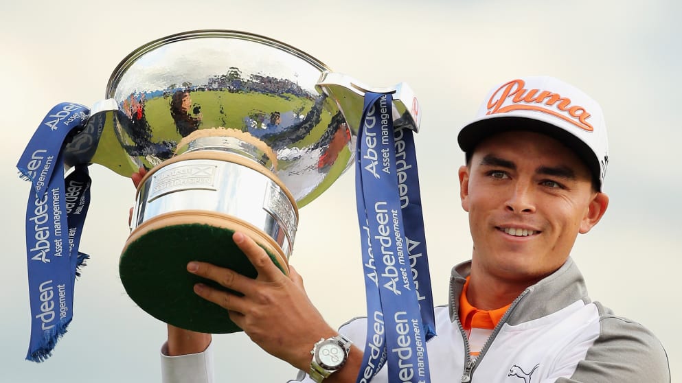 Rickie Fowler of the United States celebrates with the trophy during the trophy presentation after winning the Aberdeen Asset Management Scottish Open