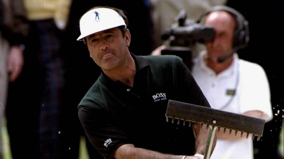 Seve hits a shot with a rake