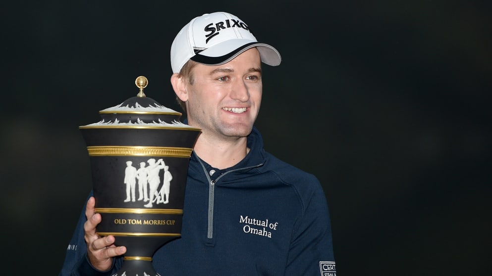 Russell Knox gets his hands on the trophy