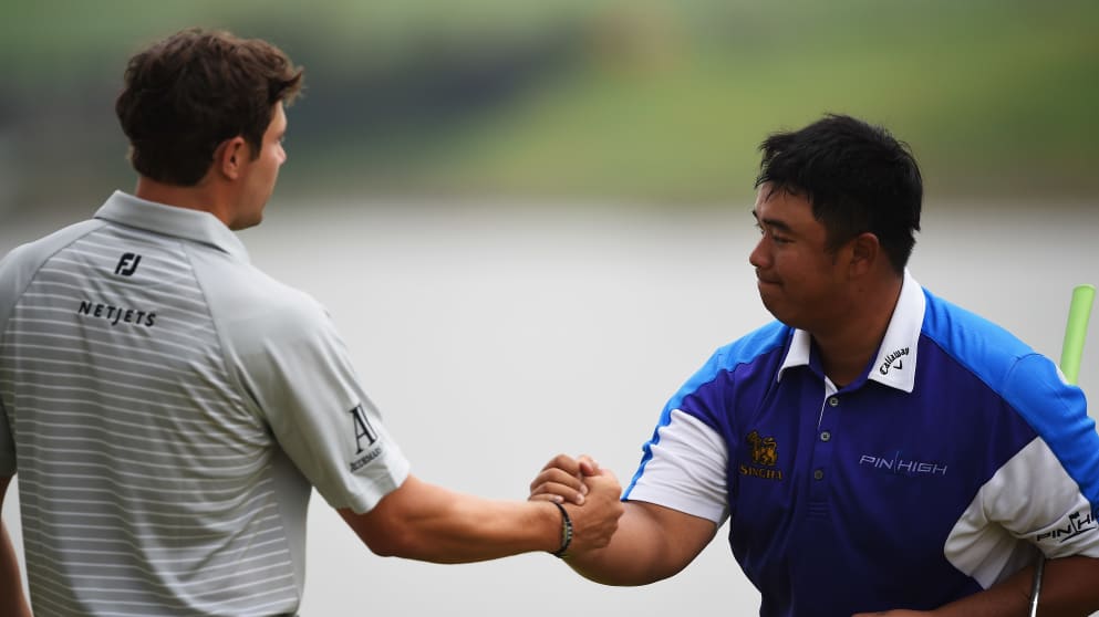 Peter Uihlein and Kiradech Aphibarnrat shake hands after the third round of the Shenzhen International