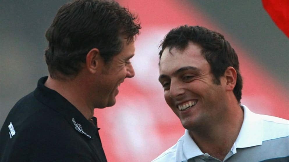 Francesco Molinari shakes hands with Lee Westwood