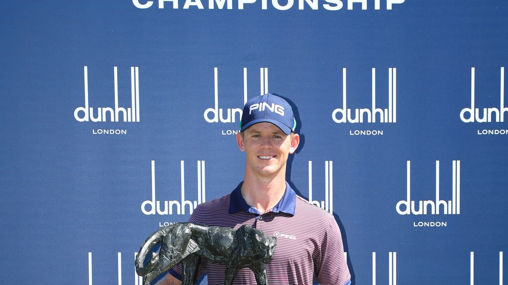 Brandon Stone holds the trophy following victory at the Alfred Dunhill Championship
