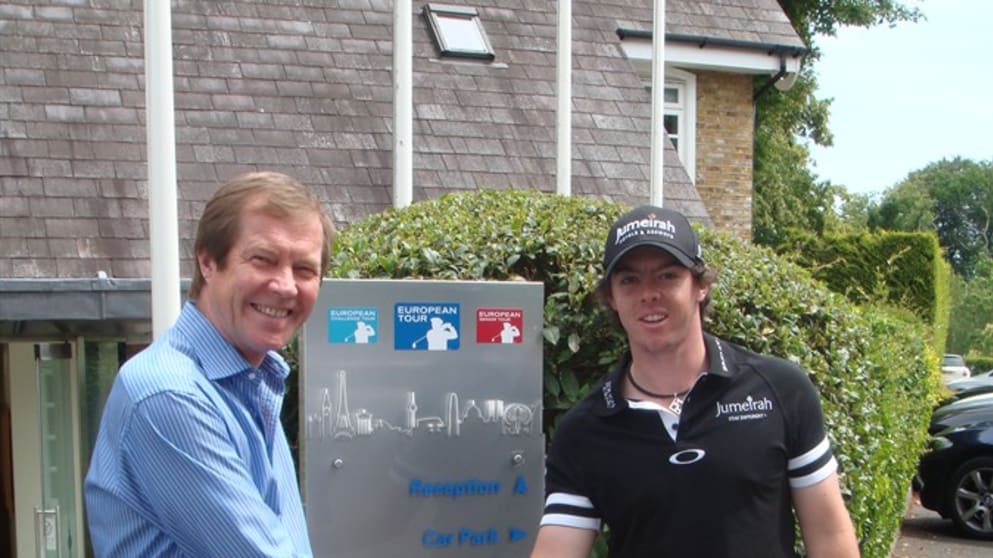 George O'Grady welcomes Rory McIlroy to Tour HQ