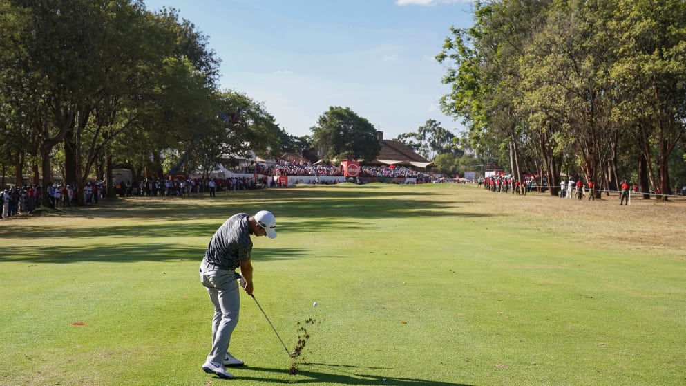 Guido Migliozzi hits the pin with his approach to the last