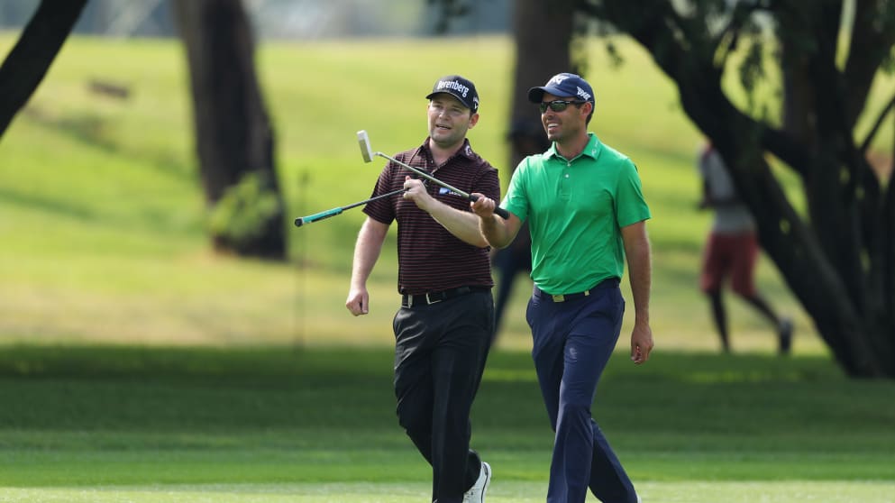 Branden Grace and Charl Schwartzel during Day One of The BMW South African Open Championship