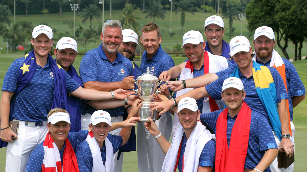 Team Europe celebrates with the EurAsia Cup after the final day's singles matches