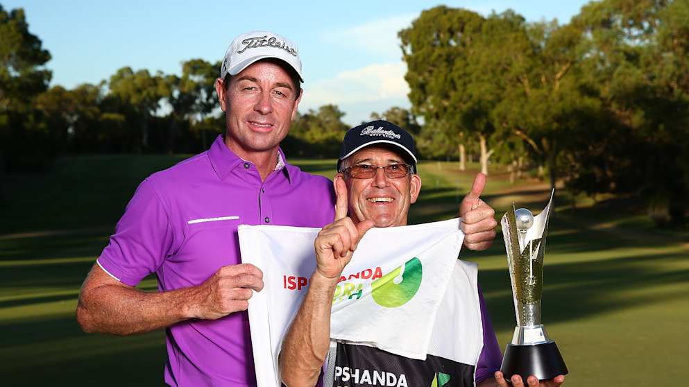 Brett Rumford and his caddie John 