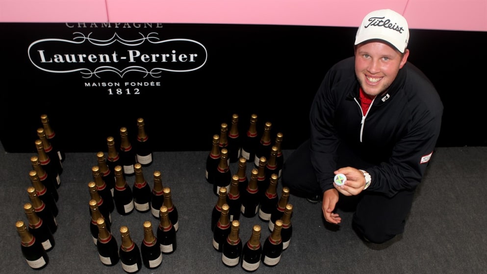 Andrew Johnston celebrates his hole in one with 168 bottles of Laurent-Perrier Champagne 
